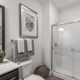 a bathroom with a glass shower