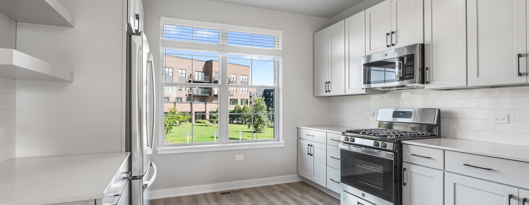 a kitchen with a large window